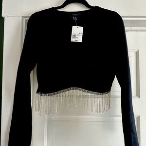 NWT knit stretch crop top with rhinestone fringe detail.